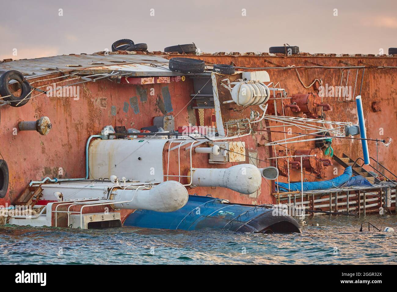 sunken tanker. Tanker Bunker threw storm ashore. The tanker lies on its side. Accident with tanker Stock Photo