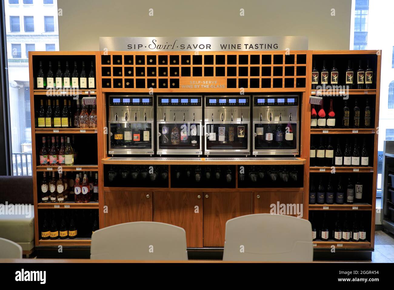 https://c8.alamy.com/comp/2GGR454/self-serve-wine-by-the-glass-wine-tasting-station-inside-heinens-grocery-store-in-downtown-clevelandohiousa-2GGR454.jpg