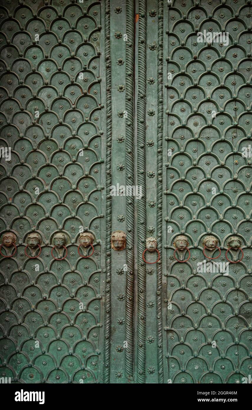 ancient iron door in the historic city of venice, italy, ornamental iron, traditional ancient craftsmanship, pattern background Stock Photo