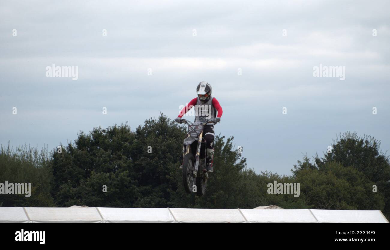 The stannage stunt team showing the crowd how to leap over a white van