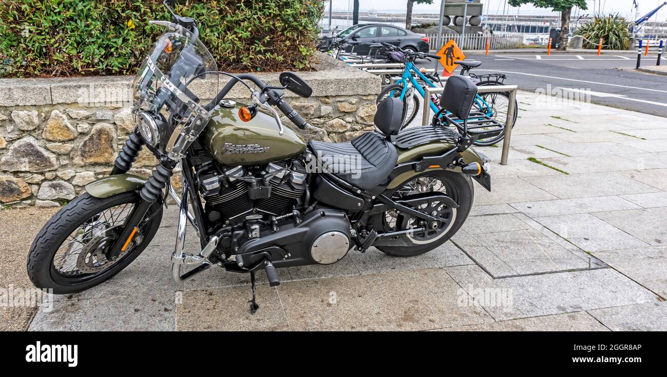 A Harley Davidson, Street Bob, motorcycle parked on the pavement in Dun Laoghaire Dublin, Ireland. Stock Photo