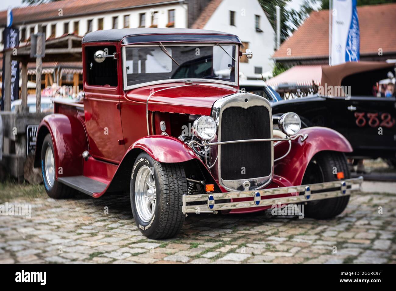 DIEDERSDORF, GERMANY - AUGUST 21, 2021: The pickup truck Chevrolet, 1930. Focus on center. Swirly bokeh. The exhibition of 'US Car Classics'. Stock Photo