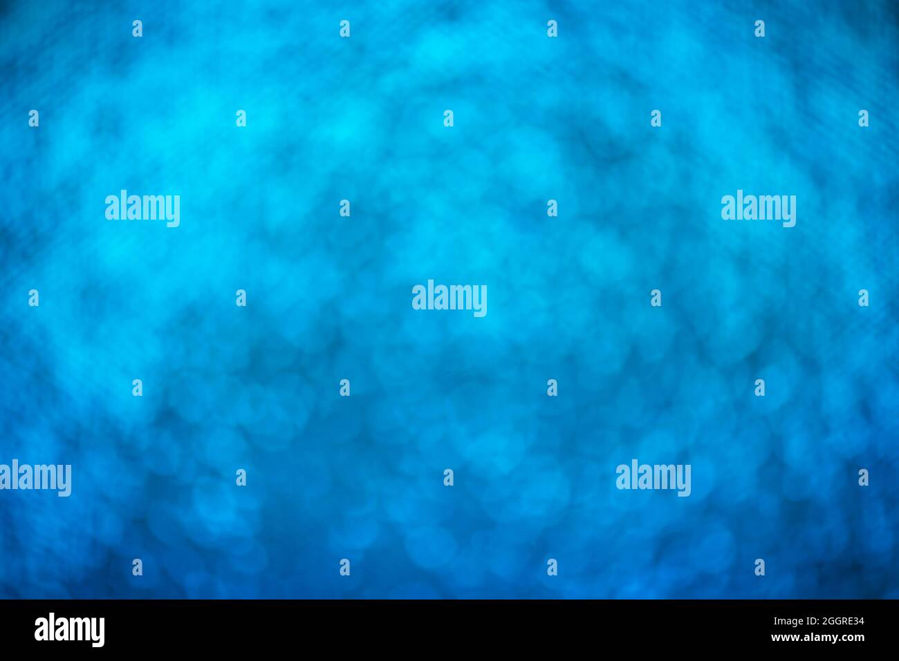 abstract blue bokeh background. Defocus light glitter Stock Photo - Alamy