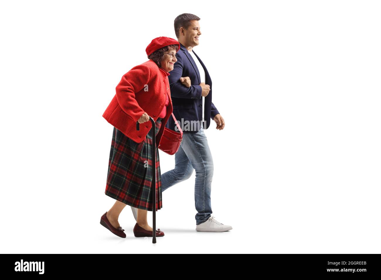 Full length profile shot of a young man helping an elderly woman ...