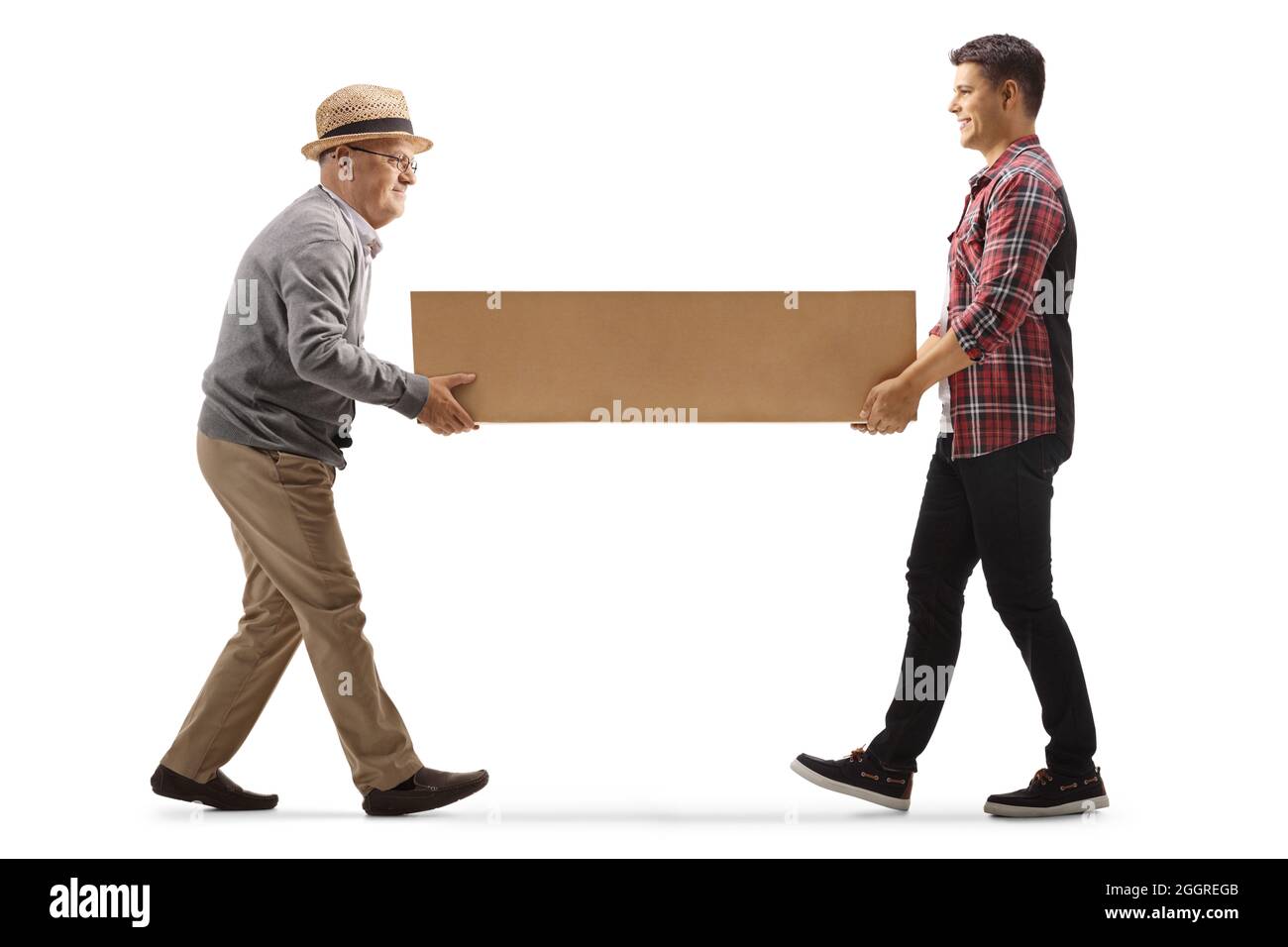 Young and elderly man carrying a cardboard box isolated on white background Stock Photo