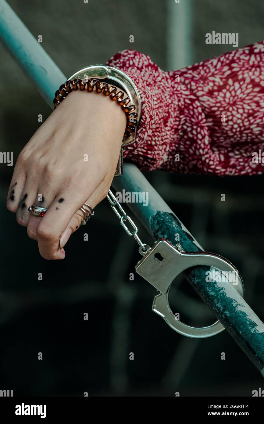 One Hand In Handcuffs . Stock Photo