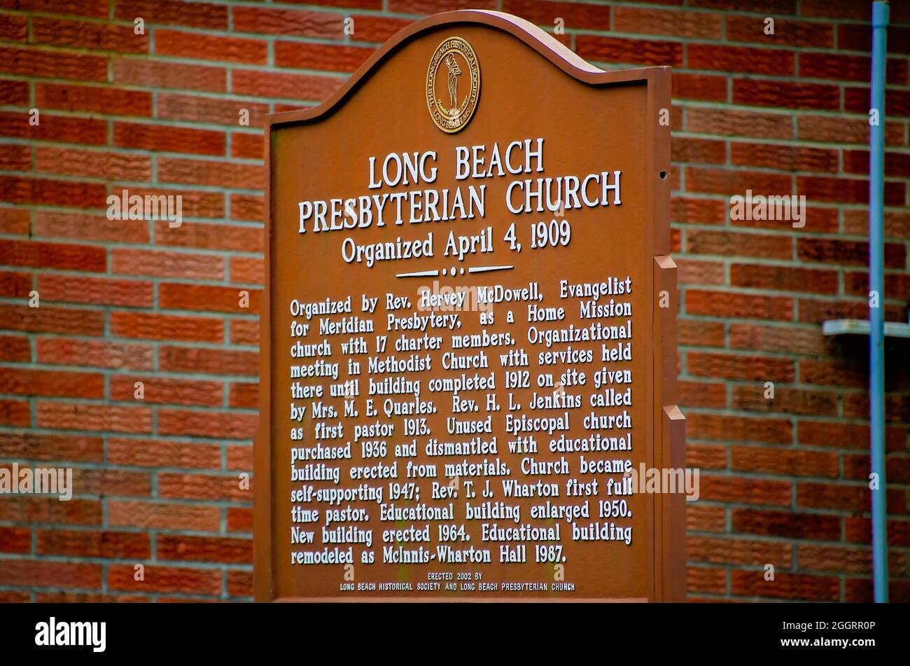 A historic marker tells the history of Long Beach Presbyterian Church, Aug. 31, 2021, in Long Beach, Mississippi. The church was organized in 1909. Stock Photo