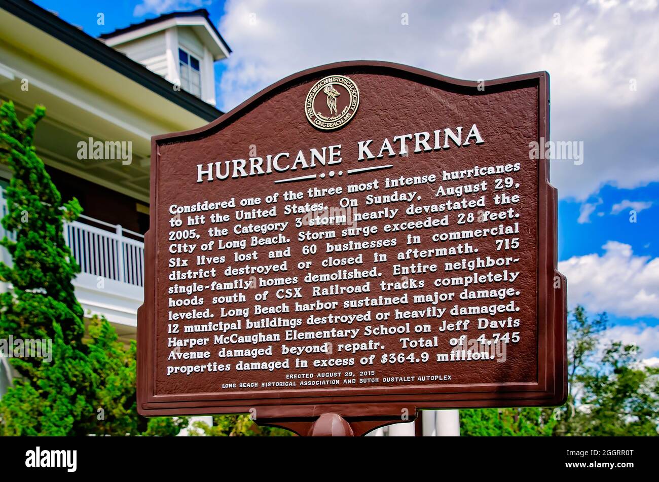 A historic marker tells the story of Hurricane Katrina’s devastation of the small coastal community of Long Beach in Long Beach, Mississippi. Stock Photo