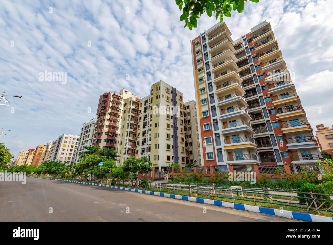 Residential multistory apartment buildings with city road at Rajarhat
