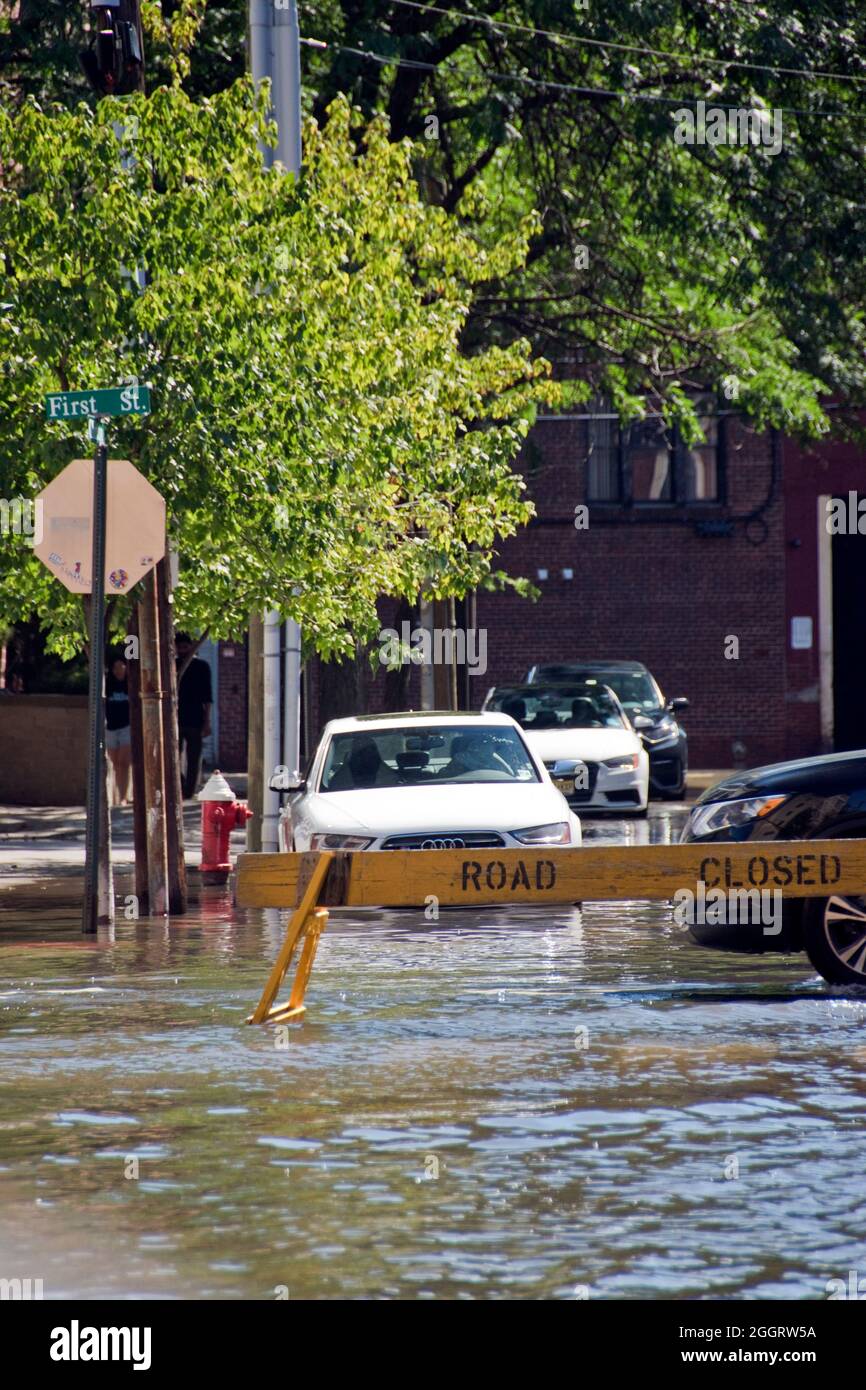 Street flooding from Hurricane Ida rain caused streets to be closed  in Hoboken, New Jersey, USA. Stock Photo