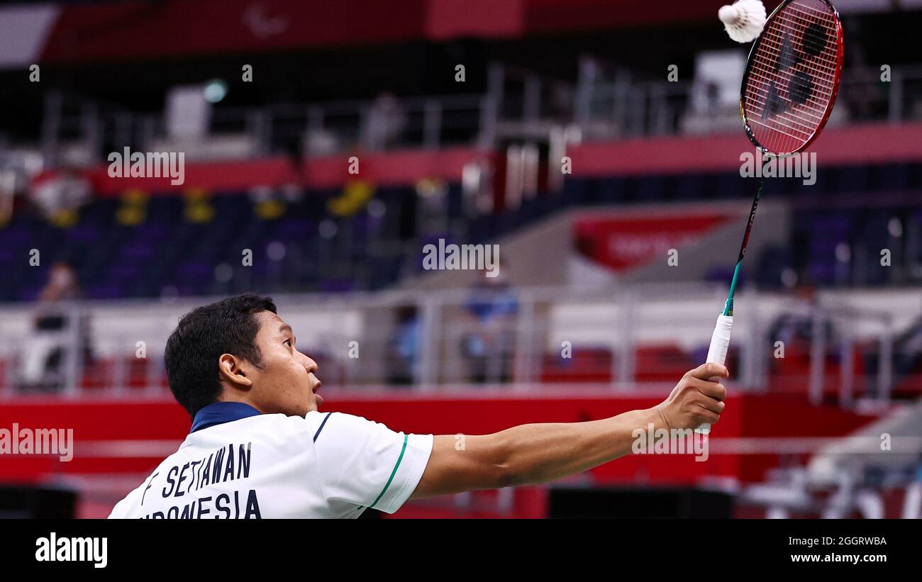 Tokyo 2020 Paralympic Games - Badminton - Men's Singles SL4 Group Play Stage - Group B - Yoyogi National Stadium, Tokyo, Japan - September 3, 2021. Fredy Setiawan of Indonesia in action against Siripong Teamarrom of Thailand. REUTERS/Thomas Peter Stock Photo