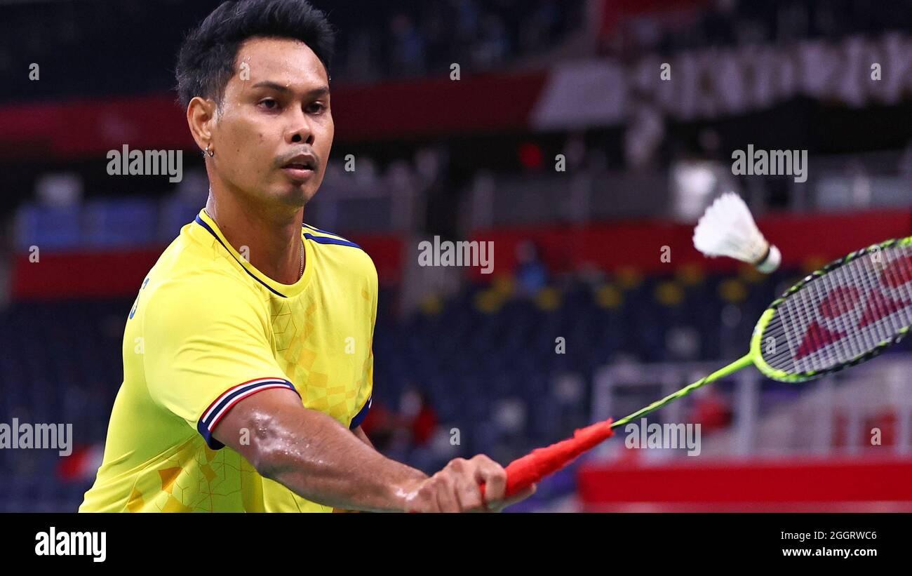 Tokyo 2020 Paralympic Games - Badminton - Men's Singles SL4 Group Play Stage - Group B - Yoyogi National Stadium, Tokyo, Japan - September 3, 2021. in Siripong Teamarrom of Thailand in action against Fredy Setiawan of Indonesia. REUTERS/Thomas Peter Stock Photo