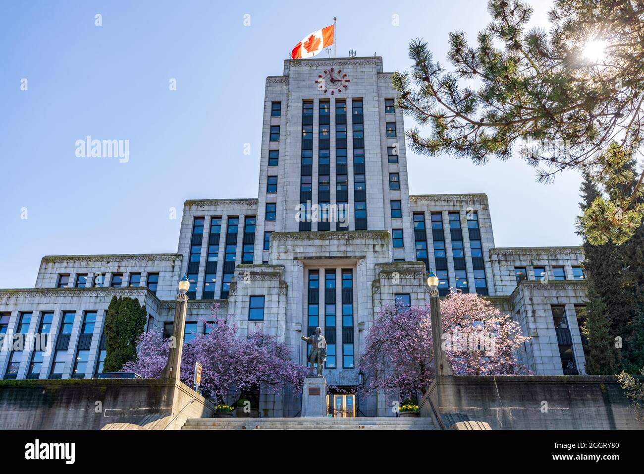 Vancouver City Hall with cherry blossoms in full bloom. Canada spring ...