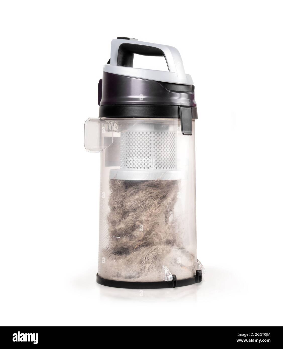 Cyclonic vacuum canister filled to the top with dust, debris, pet fur and hair. Large overfilled