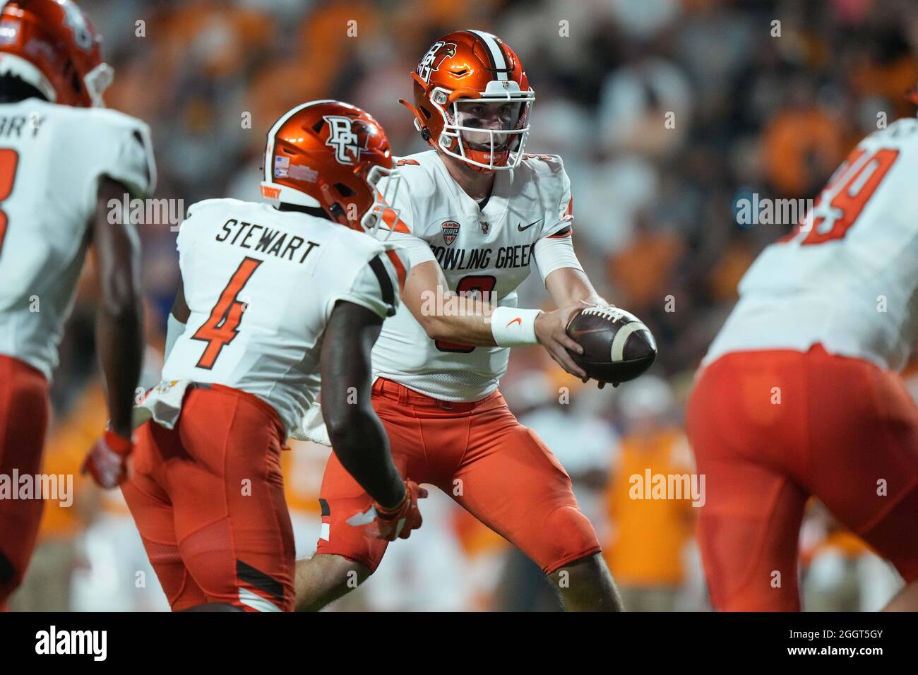 November 13, 2021: Cedric Tillman #4 of the Tennessee Volunteers runs with  the ball after a catch and is tackled by Derion Kendrick #11 of the Georgia  Bulldogs during the NCAA football