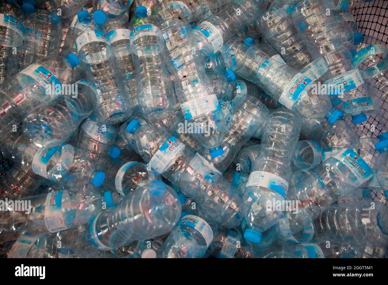 Plastic bottles are seen at the collecting point, as Bangkok city