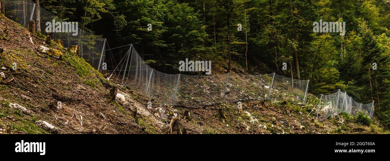Protection wire mesh against falling rocks from the mountains Stock ...