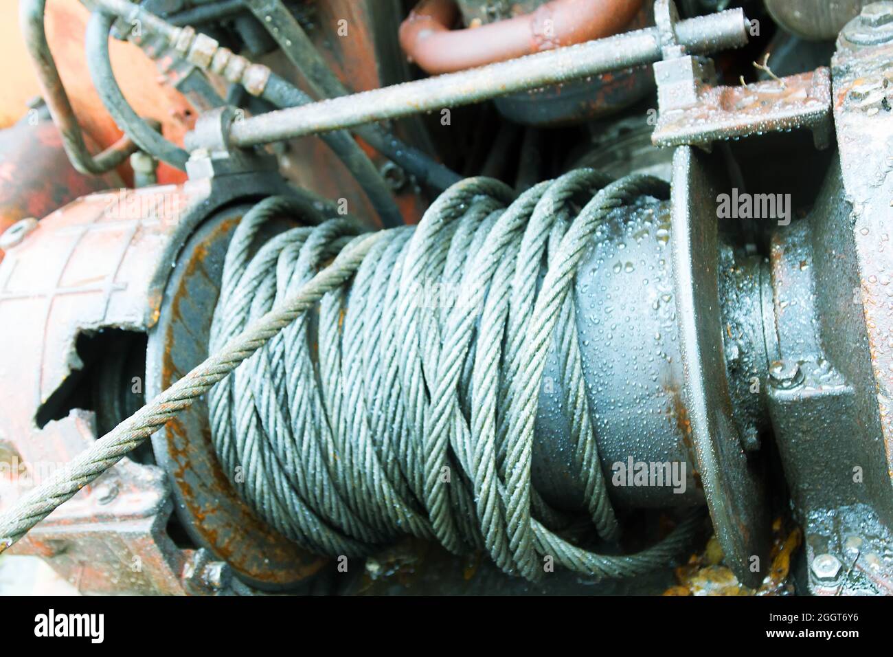 Equipment for the forestry industry. Powerful winch and steel wire rope for  self-hauling out of the swamp and pulling out fallen trees, working equipm  Stock Photo - Alamy