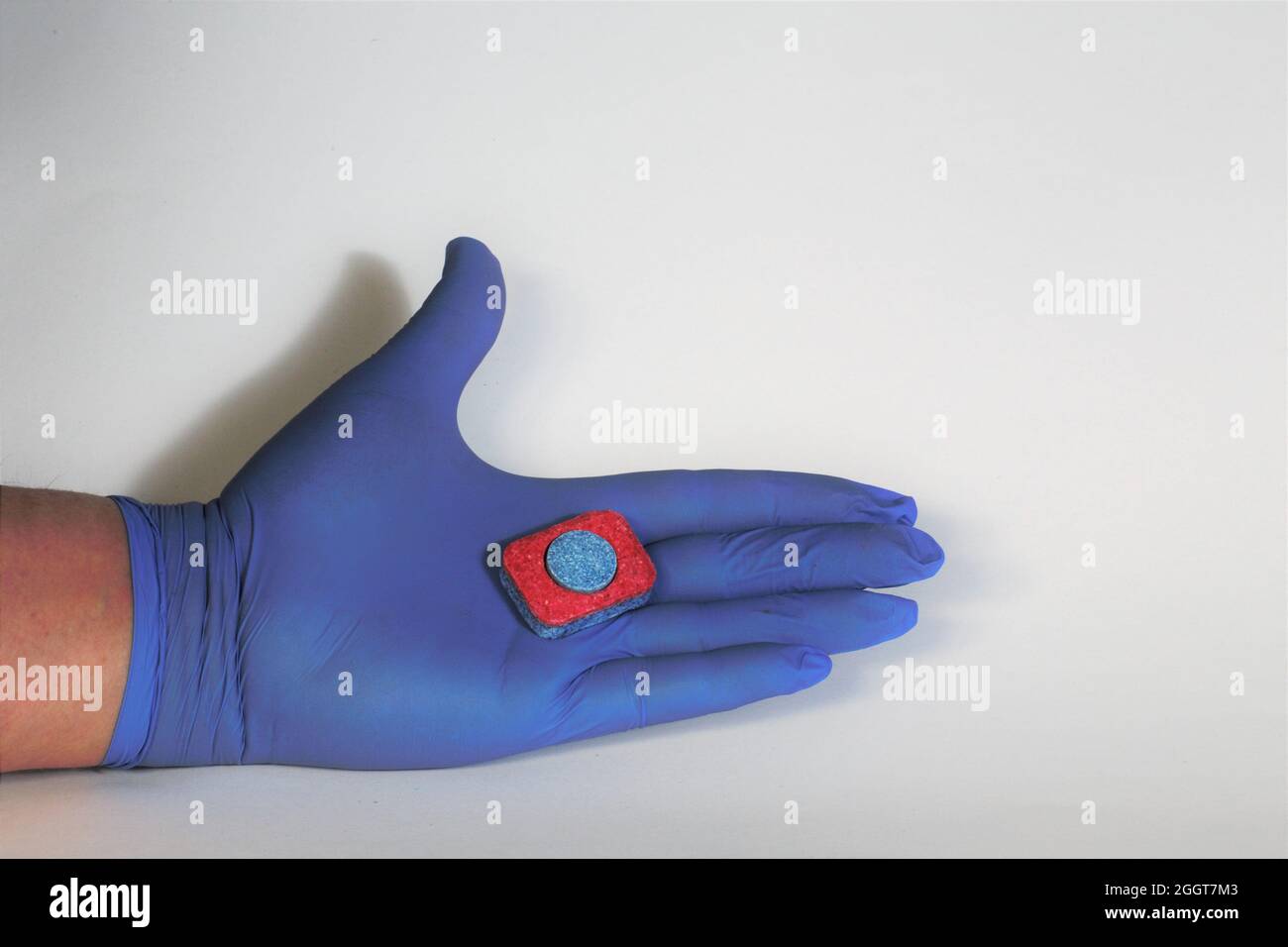 hand in glove showing thumbs up Stock Photo - Alamy