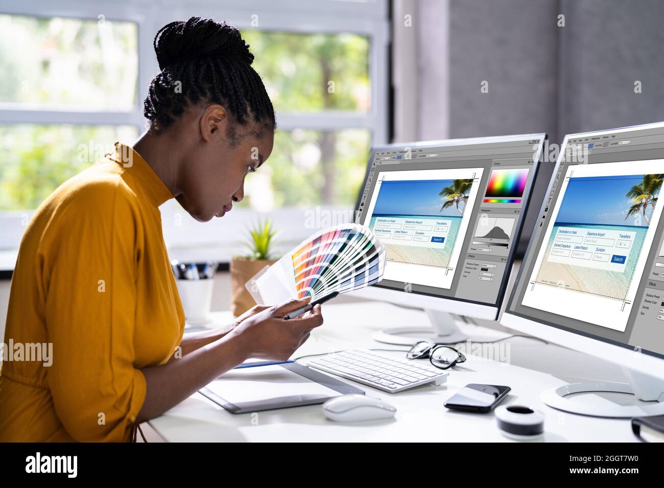 African Designer Woman Working On Computer Screen Stock Photo - Alamy