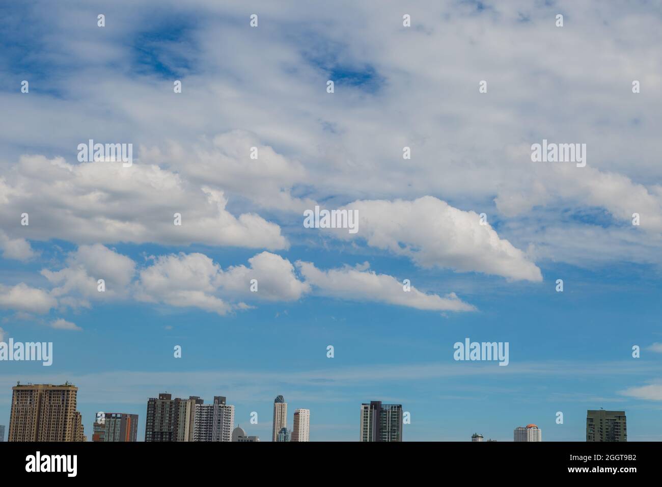 Blue sky clouds nature background on the city Stock Photo - Alamy