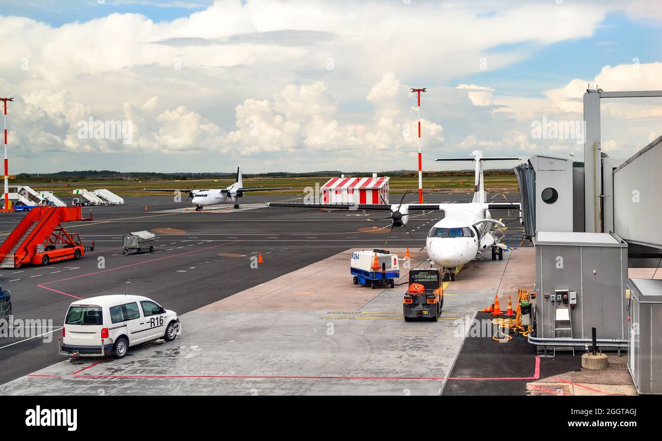 Airplane prepare to boarding in airport terminal of Helsinki Vantaa, Finland Stock Photo