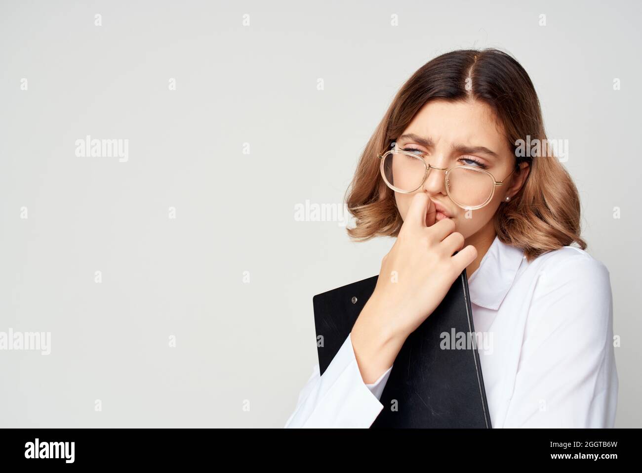 Business woman in white shirt documents work light background Stock ...