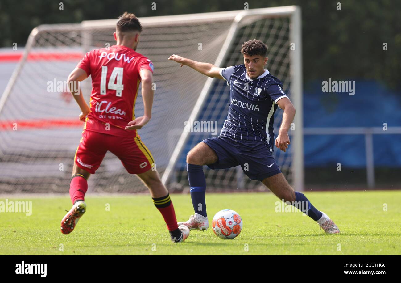 Hengelo, Netherlands. 22nd Mar, 2023. HENGELO, NETHERLANDS - MARCH 22: Noel  Futkeu of FC Twente battles for the ball with Mohammed Tolba of VfL Bochum  during the International Club Friendly match between