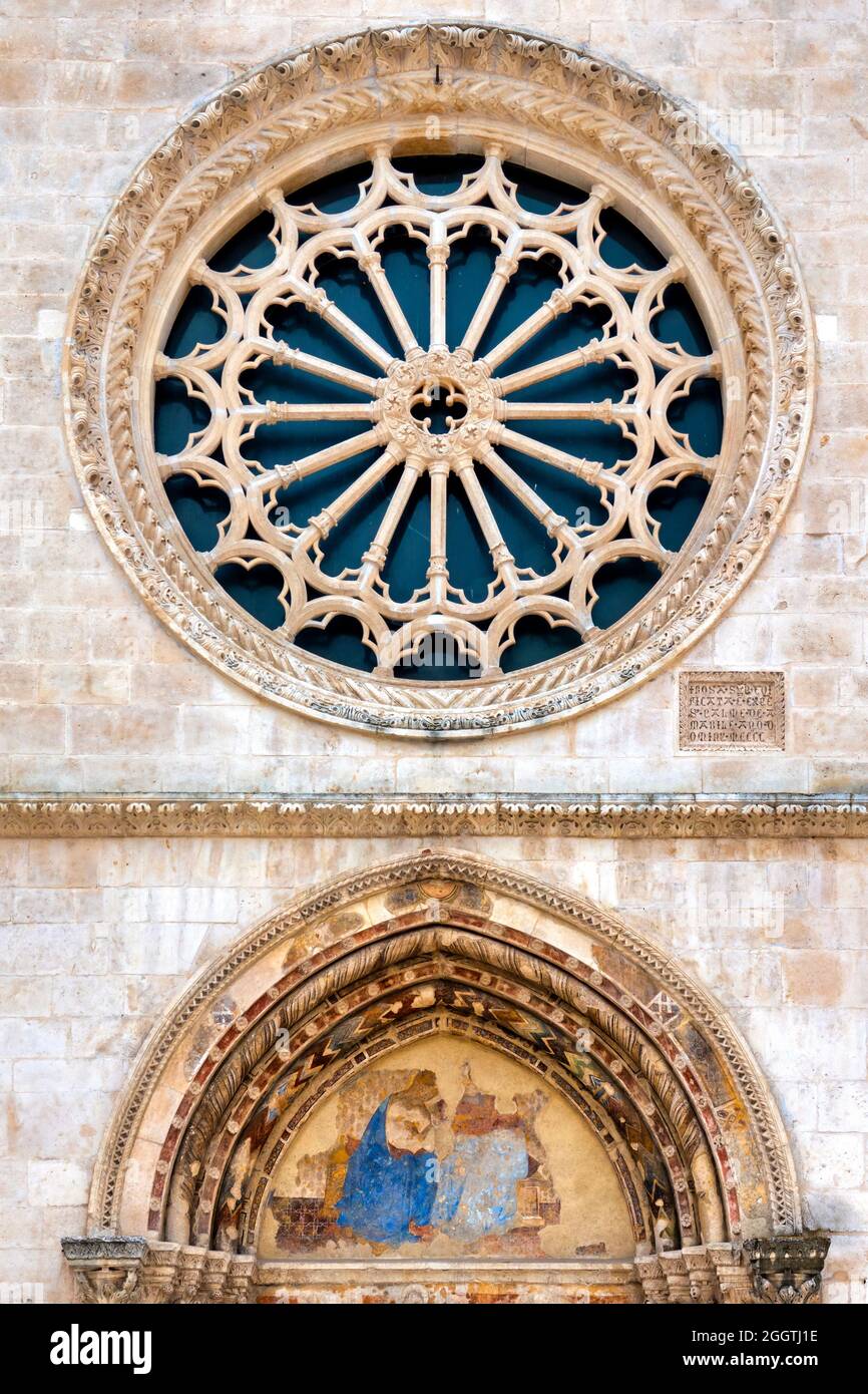 Rose window and lunette of the Church of Santa Maria della Tomba, Sulmona, Italy Stock Photo