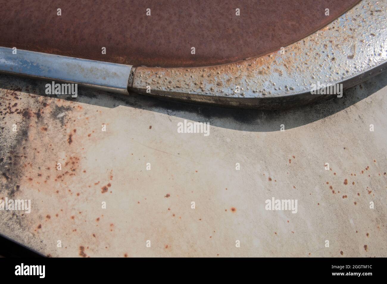 Partial view of the front of an old rusty car Stock Photo - Alamy