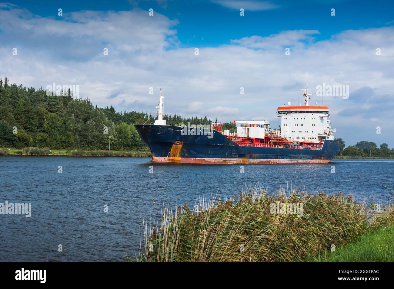 Tank vessel on the Kiel Canal near Rendsburg, Schleswig-Holstein, Germany Stock Photo