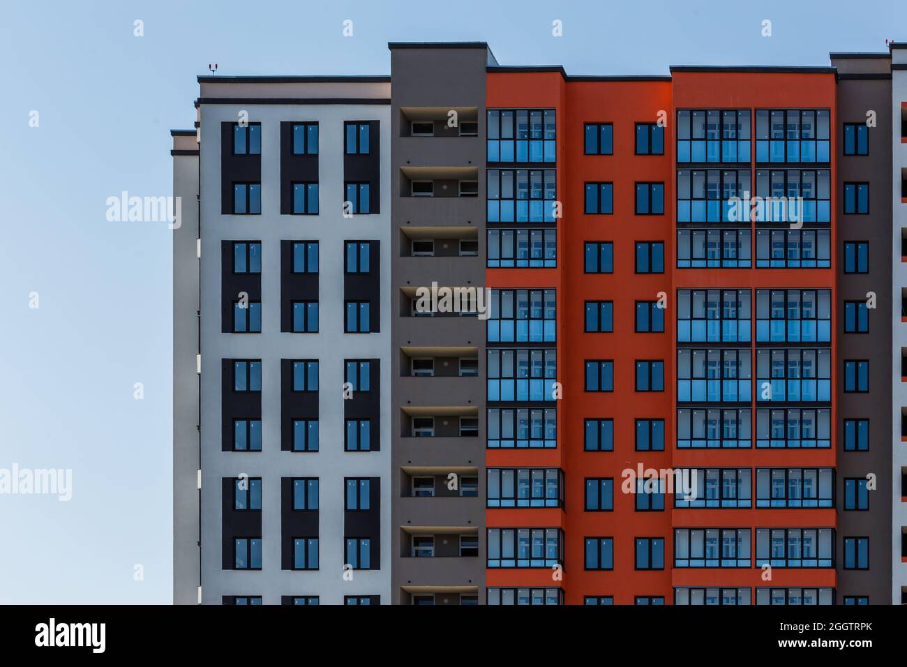 new high rise apartament building with multiple balcony and windows on ...