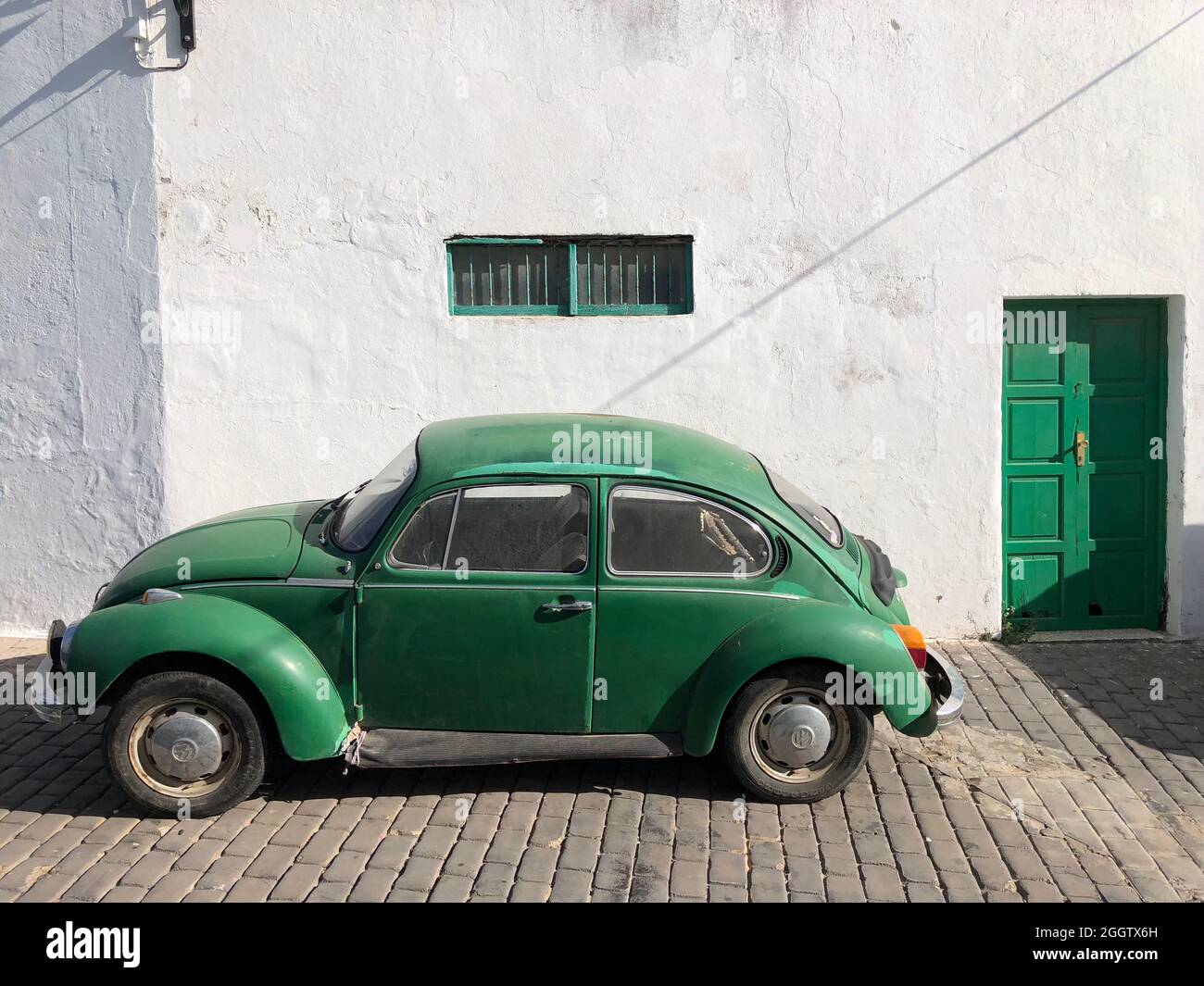 Lanzarote Spain Famous green car near a white houses Stock Photo