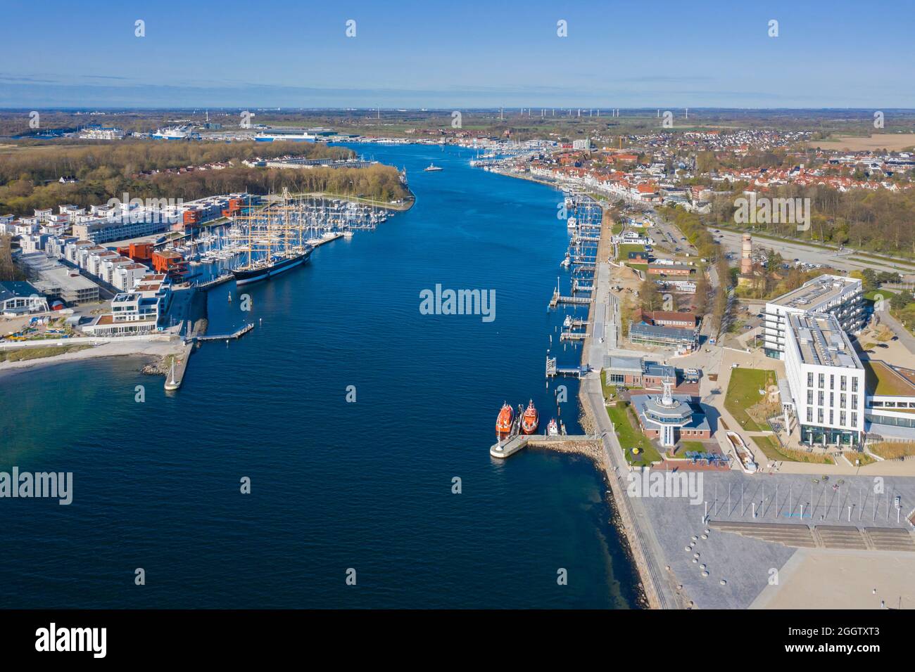 Aerial view over port / harbour at mouth of the river Trave at seaside resort Travemünde, Hanseatic City of Lübeck, Schleswig-Holstein, Germany Stock Photo