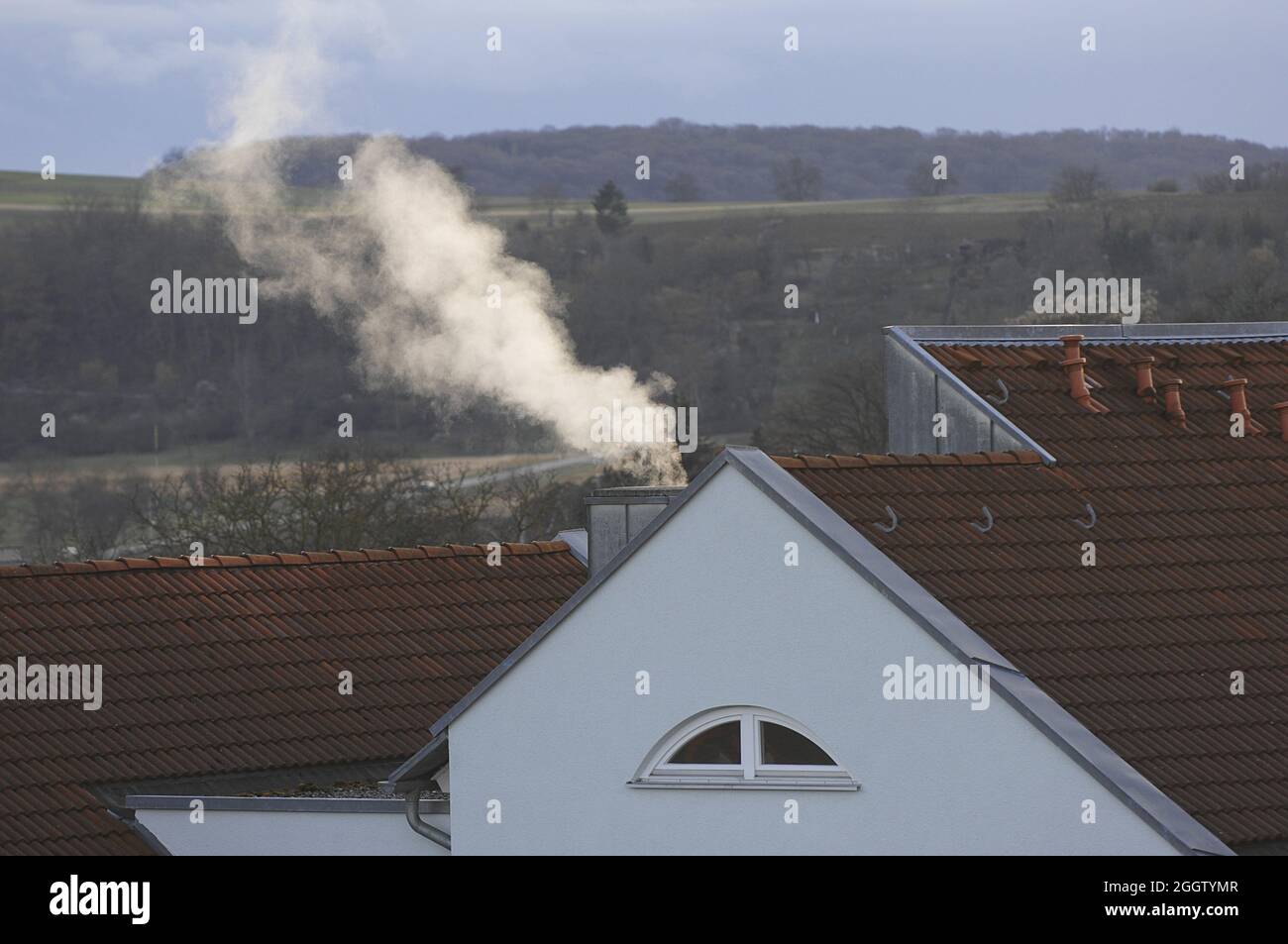smoking chimney of a house, Germany Stock Photo Alamy