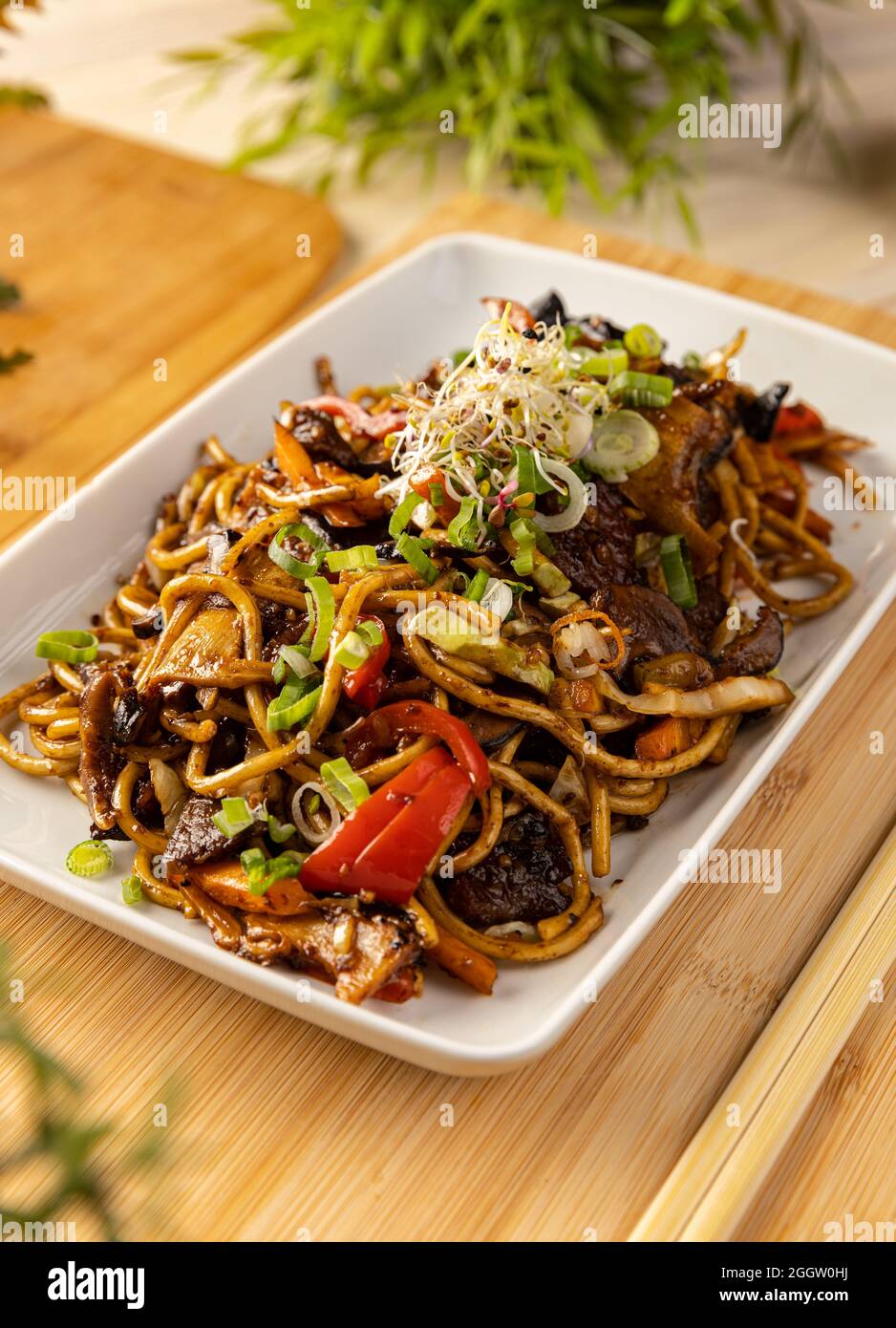 Delicious noodles stir fry with ear wood mushrooms and vegetables Stock