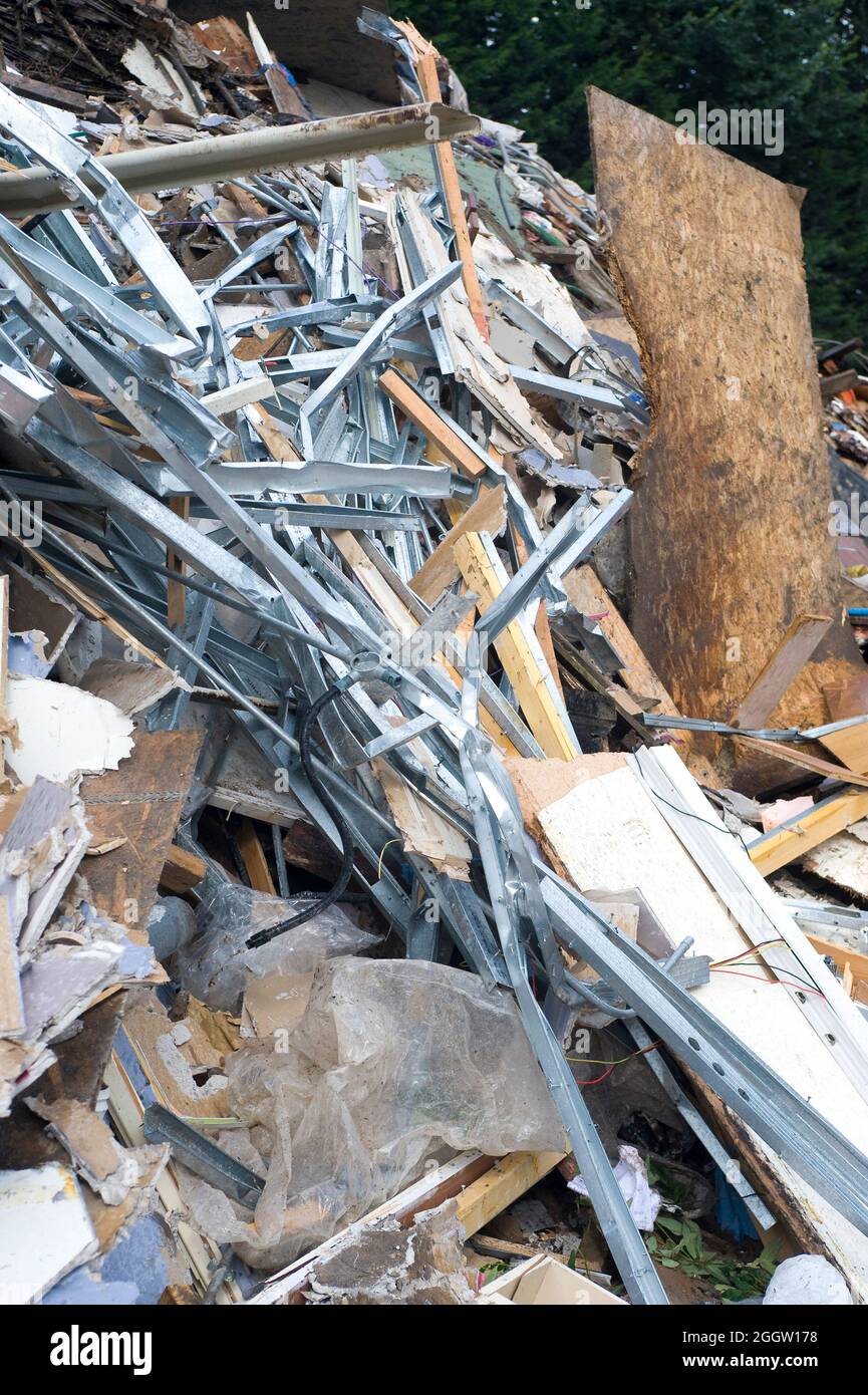 Piles of domestic waste at a materials recycling facility in England. Stock Photo
