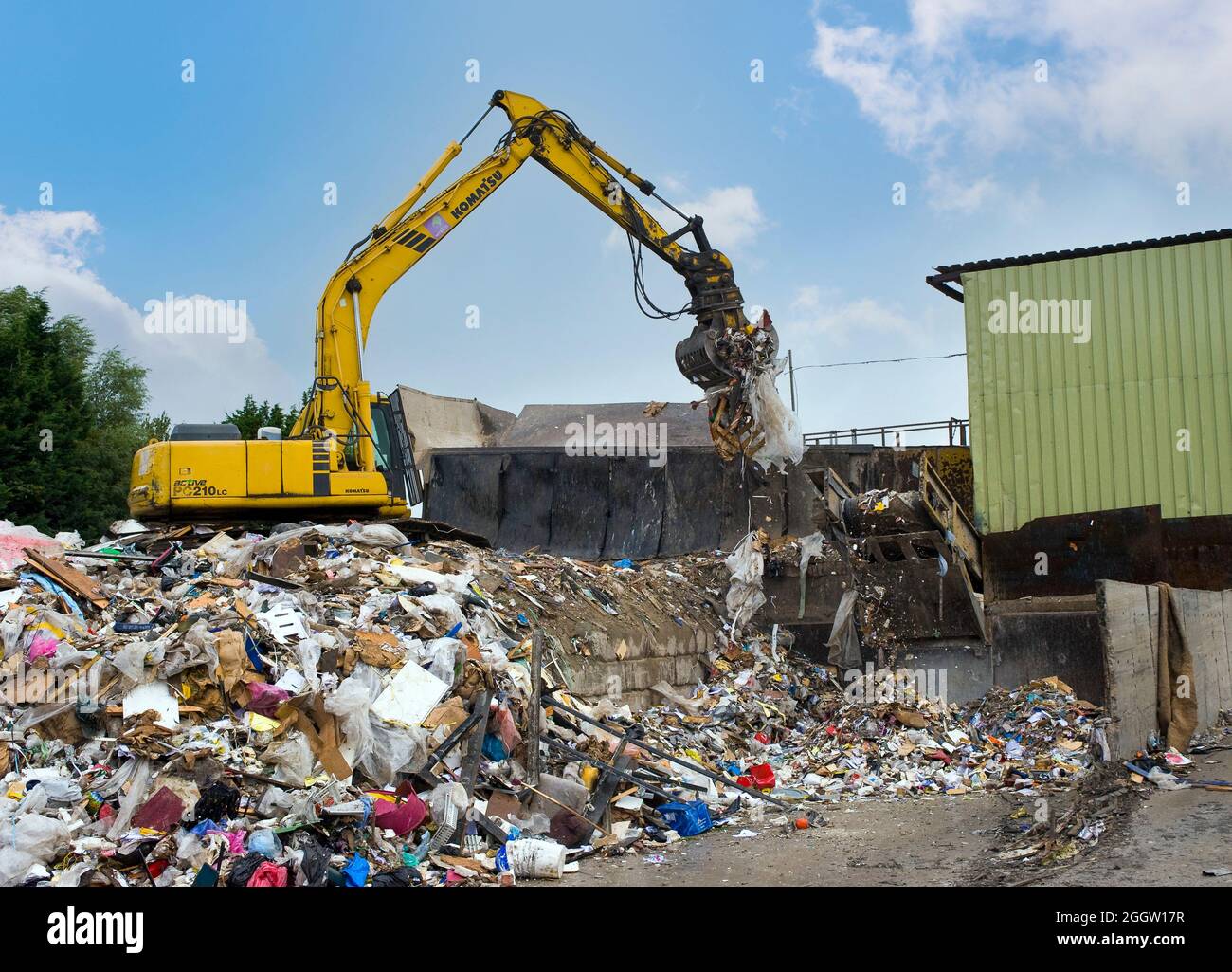 Komatsu crawler excavator working at a materials recycling facility in the UK. Stock Photo
