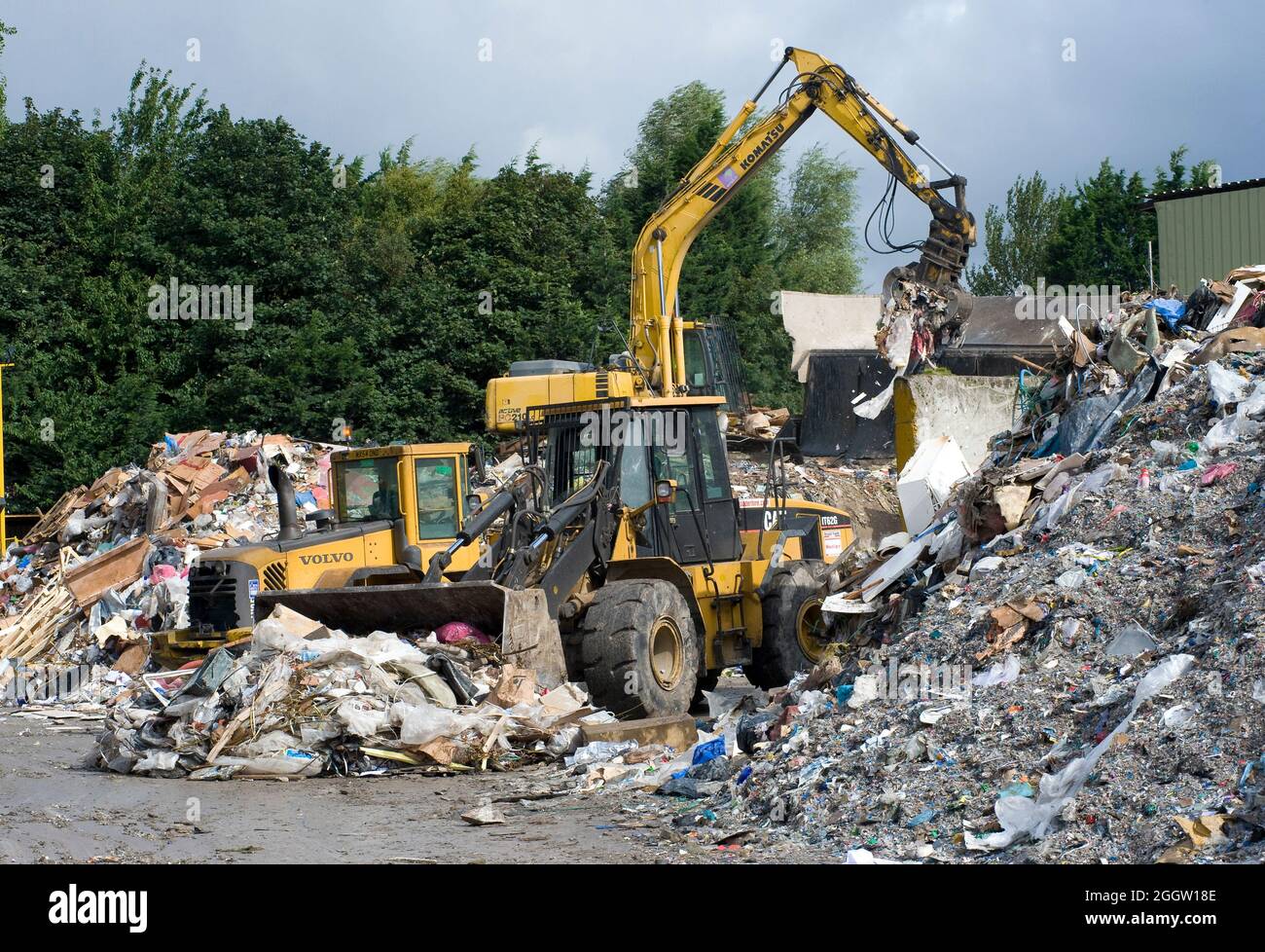 Cat wheel excavator working at a materials recycling facility in the UK. Stock Photo