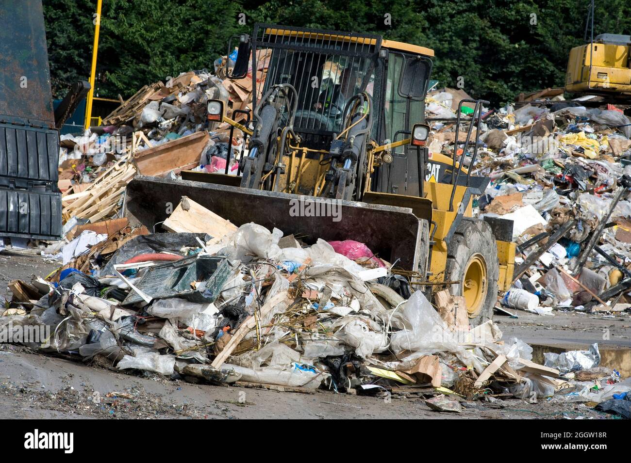 Cat wheel dozer working at a materials recycling facility in the UK. Stock Photo