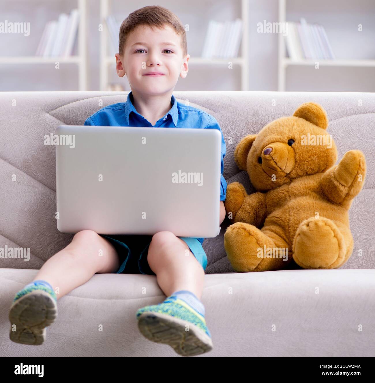 The little boy surfing internet on laptop Stock Photo - Alamy