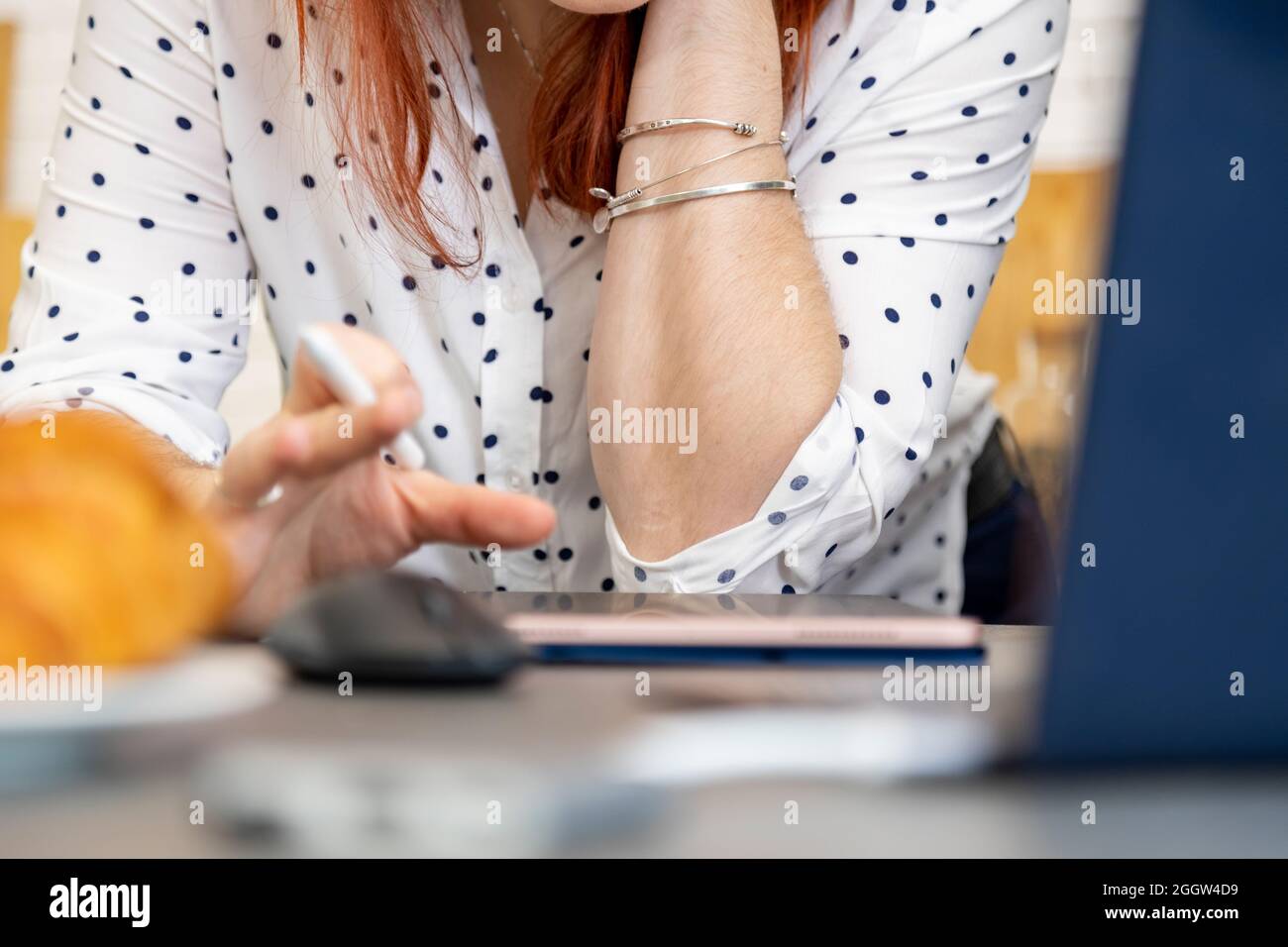 woman draws on a digital tablet with a touch screen. no face. close-up. Stock Photo