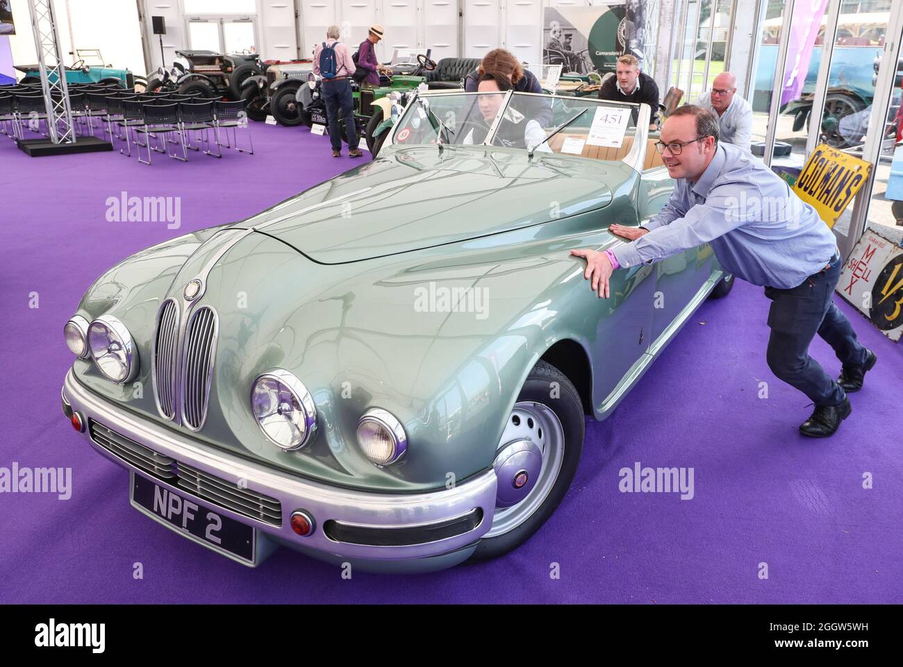 Beaulieu, Hampshire, UK 3rd September 2021. The team at Bonhams position a rare 1949 Bristol 402 Drophead Coupé formally owned by Hollywood actress Jean Simmons, which is to be offered at auction at the Bonhams MPH Beaulieu Sale this Sunday, with an estimate of £150,000 – 200,000. One of the most glamorous luxury motor cars of its day, the Bristol was bought new for the Hollywood actress by her future husband and fellow star Stewart Granger as one of a matching pair. Credit: Stuart Martin/Alamy Live News Stock Photo