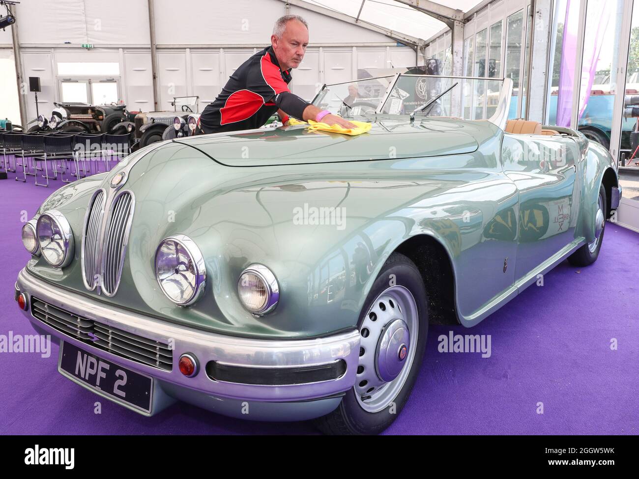 Beaulieu, Hampshire, UK 3rd September 2021. Jonathan Underwood gives a final polish to rare 1949 Bristol 402 Drophead Coupé formally owned by Hollywood actress Jean Simmons, which is to be offered at auction at the Bonhams MPH Beaulieu Sale this Sunday, with an estimate of £150,000 – 200,000. One of the most glamorous luxury motor cars of its day, the Bristol was bought new for the Hollywood actress by her future husband and fellow star Stewart Granger as one of a matching pair. Credit: Stuart Martin/Alamy Live News Stock Photo