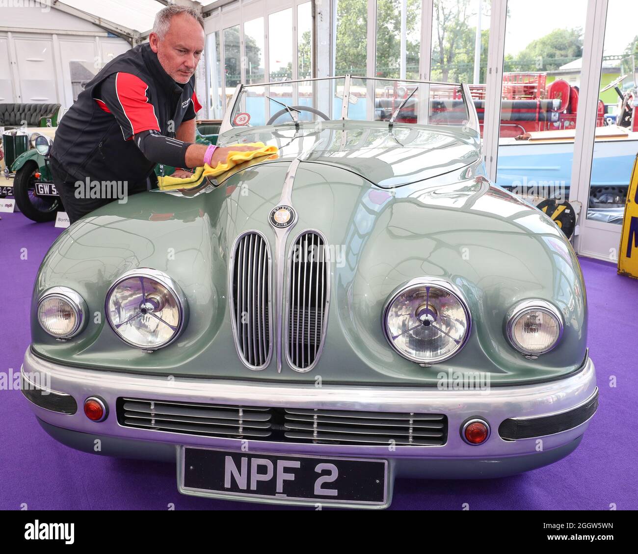 Beaulieu, Hampshire, UK 3rd September 2021. Jonathan Underwood gives a final polish to rare 1949 Bristol 402 Drophead Coupé formally owned by Hollywood actress Jean Simmons, which is to be offered at auction at the Bonhams MPH Beaulieu Sale this Sunday, with an estimate of £150,000 – 200,000. One of the most glamorous luxury motor cars of its day, the Bristol was bought new for the Hollywood actress by her future husband and fellow star Stewart Granger as one of a matching pair. Credit: Stuart Martin/Alamy Live News Stock Photo