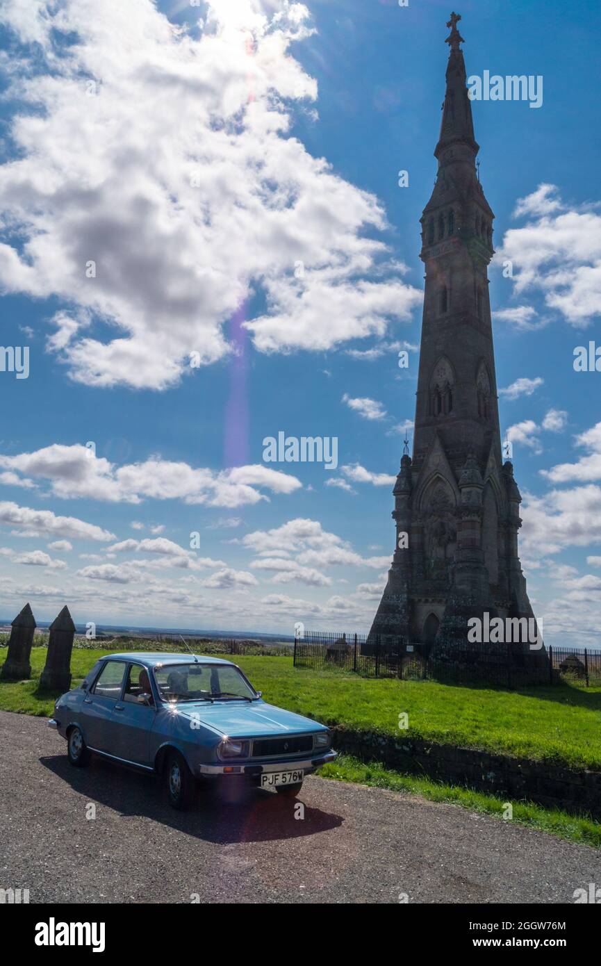 Newly restored 1980 model Renault 12 car parked by the Sledmere Tower folly, East Riding, Yorkshire, England, 2021 Stock Photo