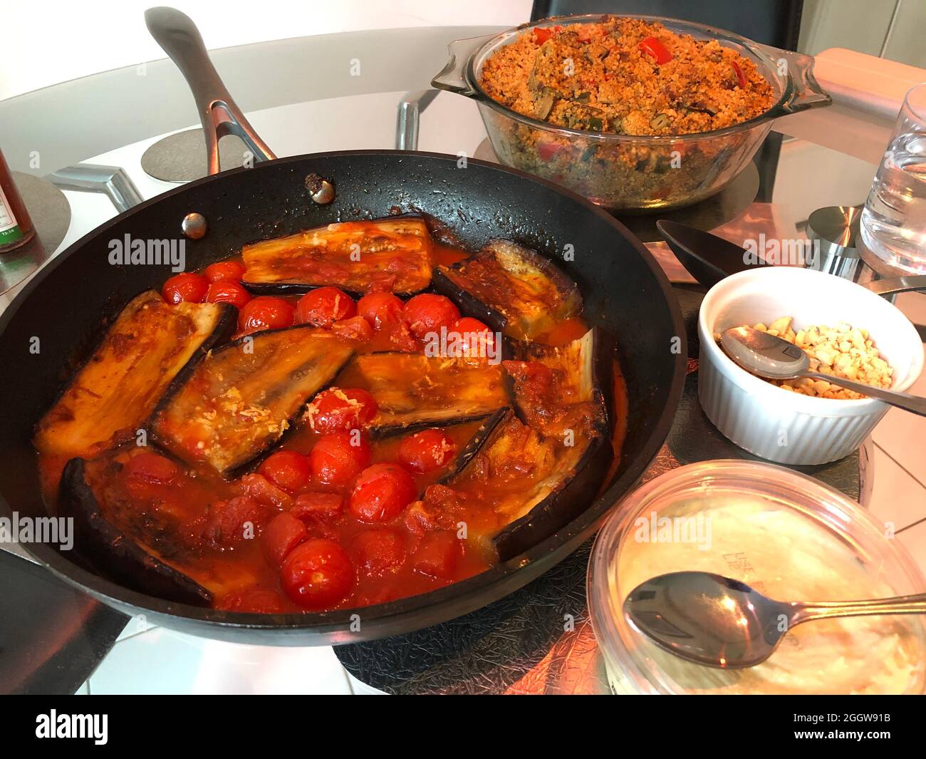 cooking-aubergines-in-a-frying-pan-stock-photo-alamy