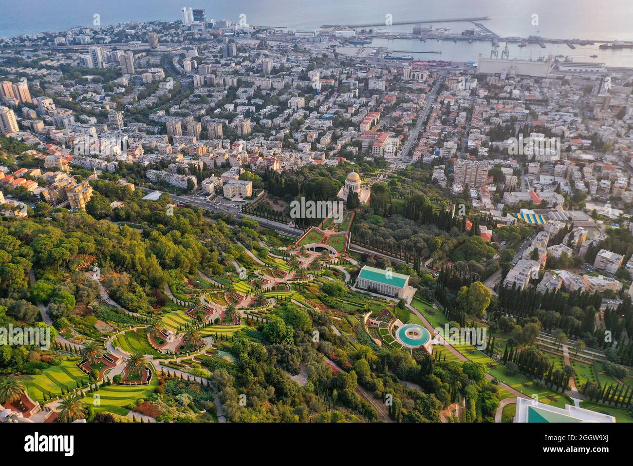 Bahai temple and gardens and Downtown Haifa at sunrise, Aerial image. Stock Photo