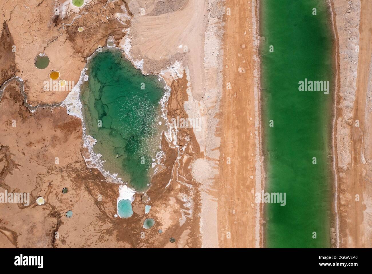 Sinkholes in The Dead Sea coastline, Aerial view. Stock Photo