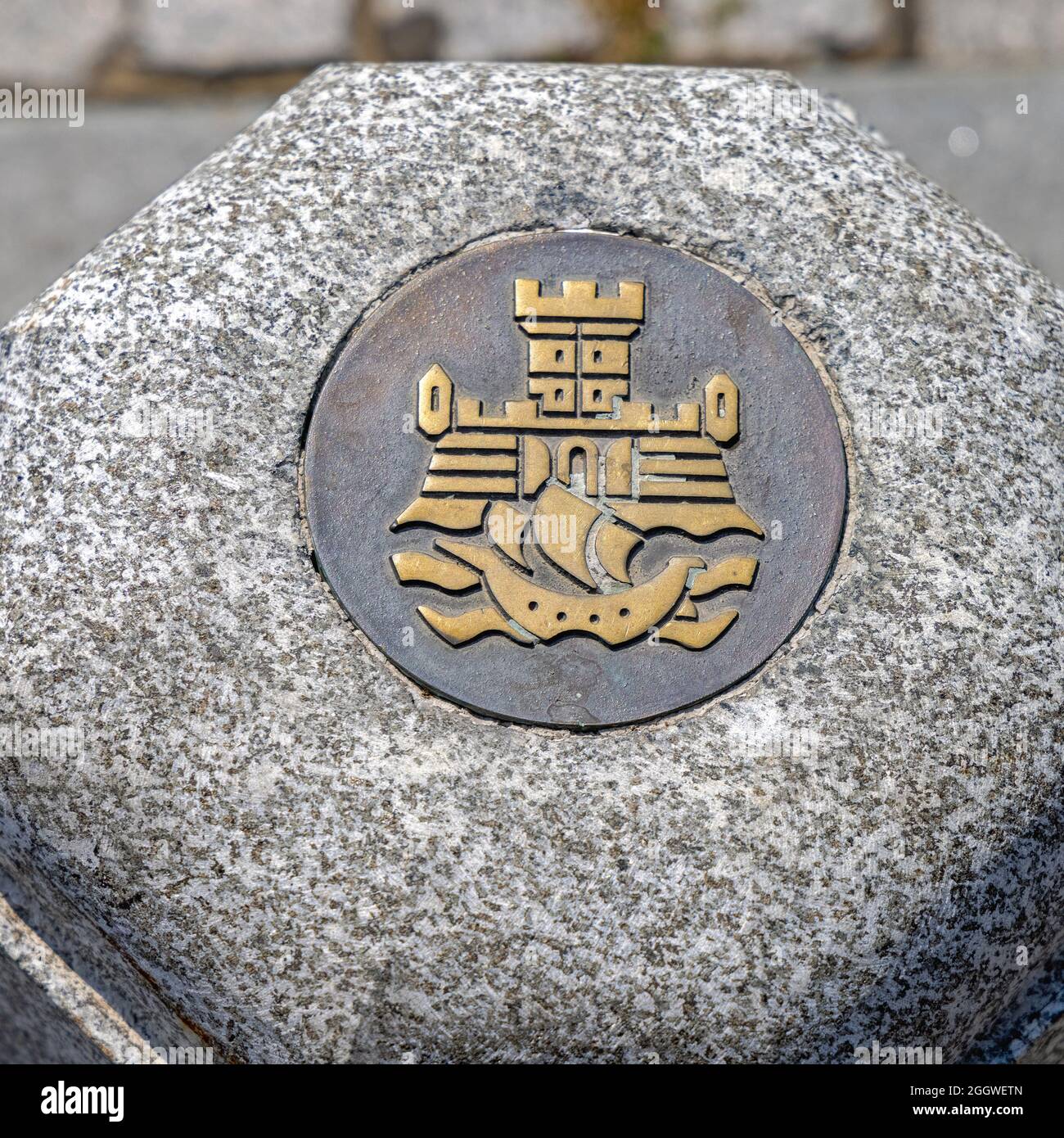 Belgrade, Serbia - August 08, 2021: Bronze Sign at Bollard Belgrade City Coat of Arms. Stock Photo